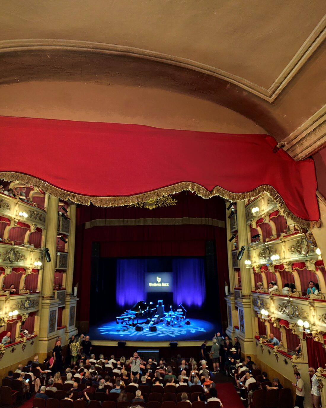 The auditorium of a historic Perugia theatre during a performance