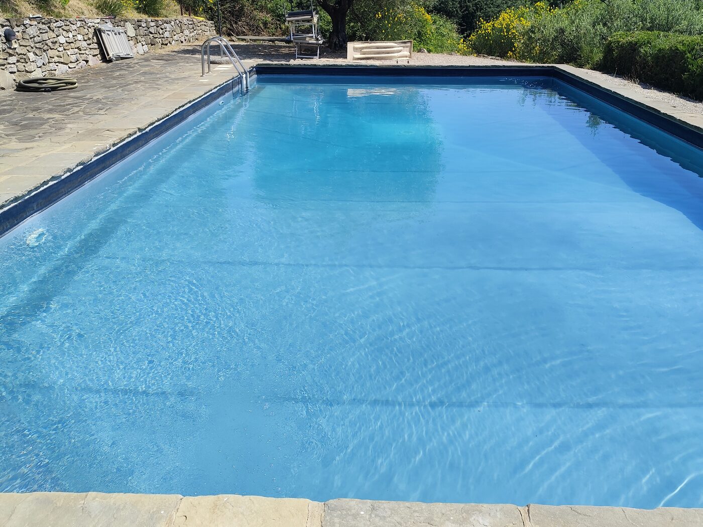 The pool of an Umbrian villa opened at the start of the season